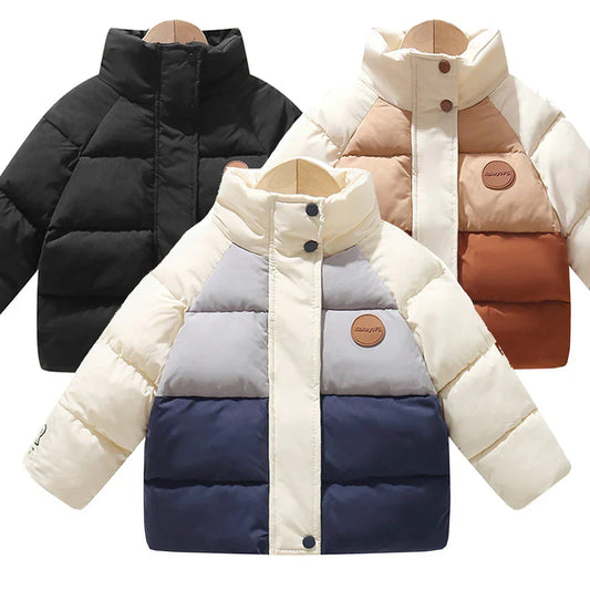 Toddler girl in pink polka dot insulated winter coat, smiling outdoors, kids warm jacket