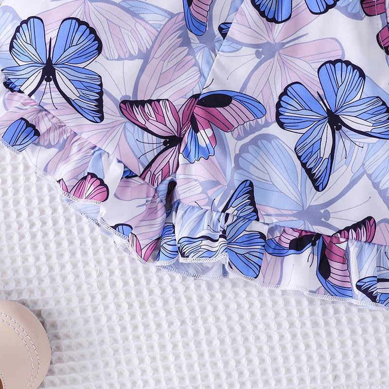Close-up of the skirt of a purple girls' princess dress, showing flowy material and fancy design