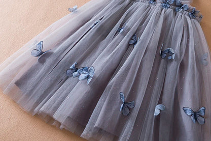 Baby girl's summer party outfit: Butterfly adorned princess dress with elegant floral embroidery.