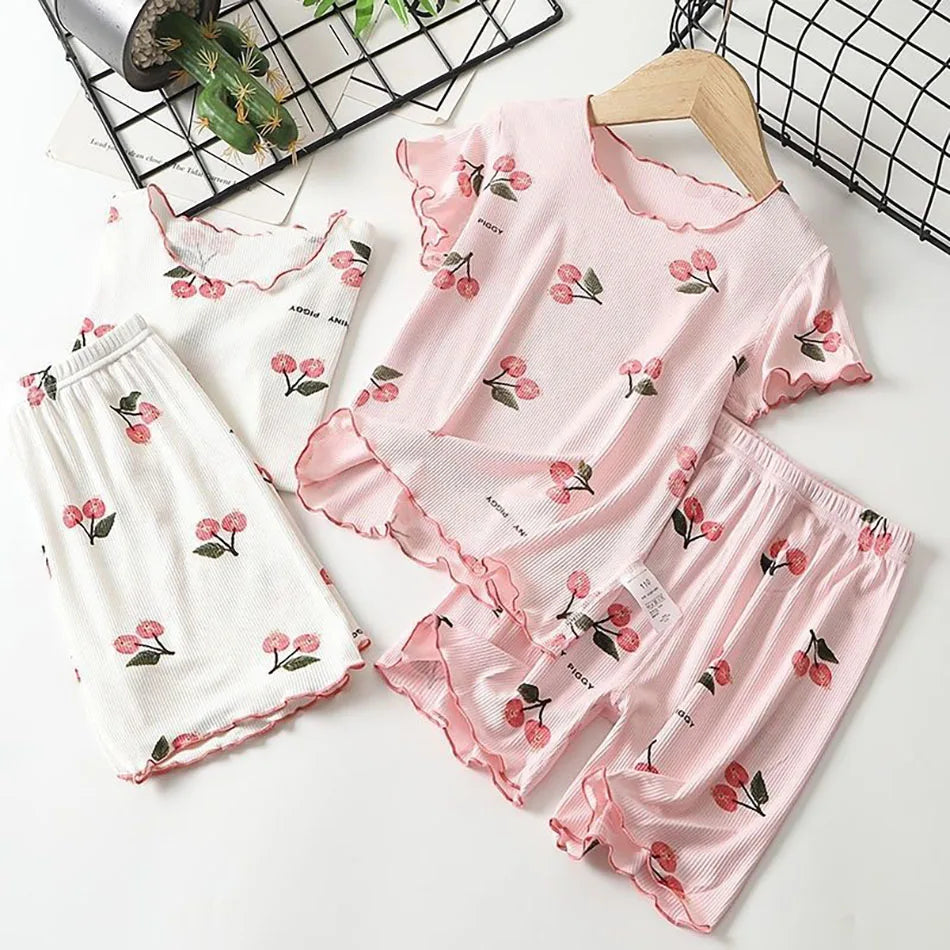 Girls' breathable modal cotton pajama set with cute cherry print, ideal for summer loungewear, ages 1-8