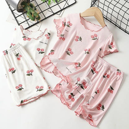 Girls' breathable modal cotton pajama set with cute cherry print, ideal for summer loungewear, ages 1-8