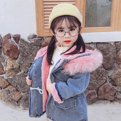Girls' casual denim jacket with a luxurious faux fur hood, a stylish and warm kids outerwear piece.
