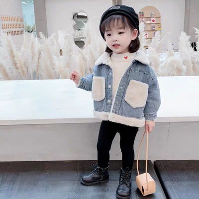 Fashionable girls' denim jacket and warm winter coat, complete with a cozy faux fur lined hood.