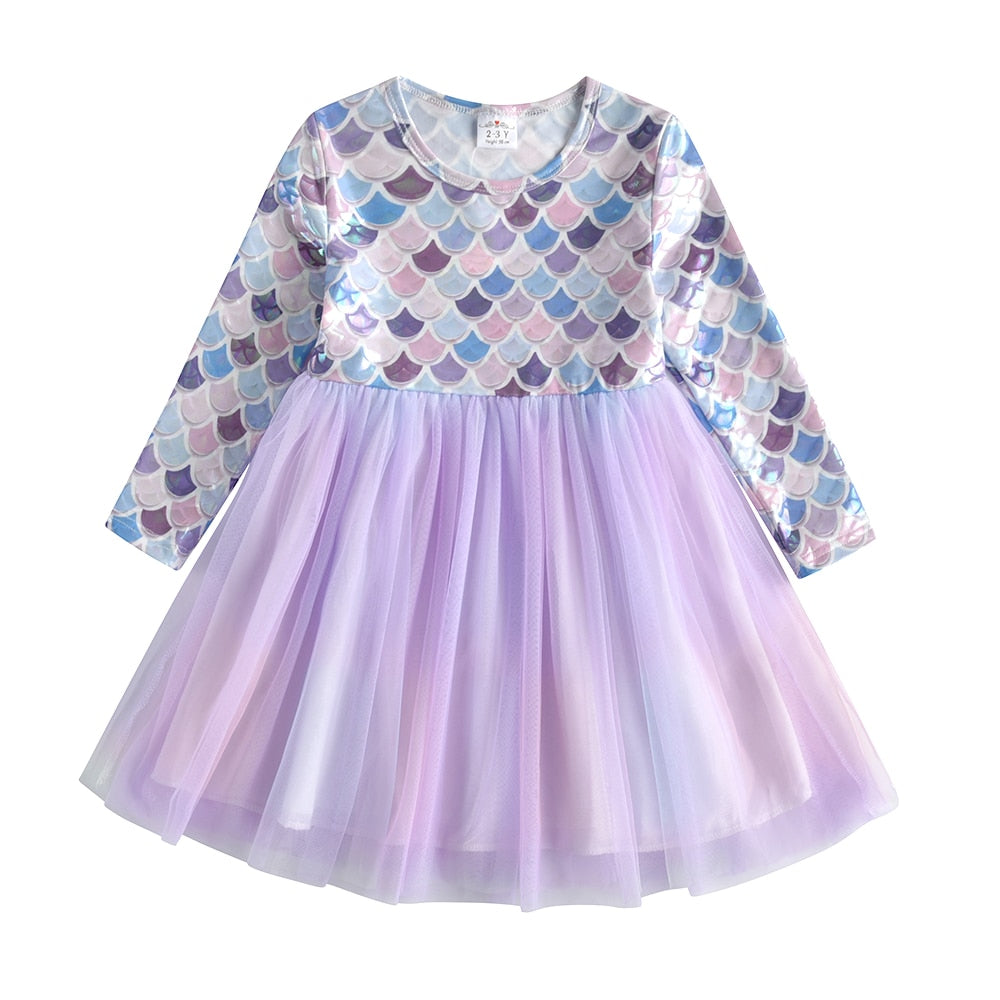 Hanging display of a girls' holiday snowflake long sleeve mesh dress, ready for gifting.