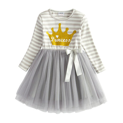 Festive snowflake print on a girls' long sleeve mesh dress, embodying Christmas spirit.