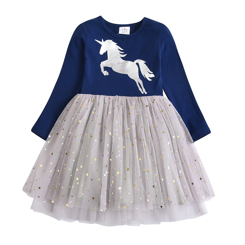 Detail of the long sleeve and mesh fabric on a girl's festive snowflake dress, winter wear.