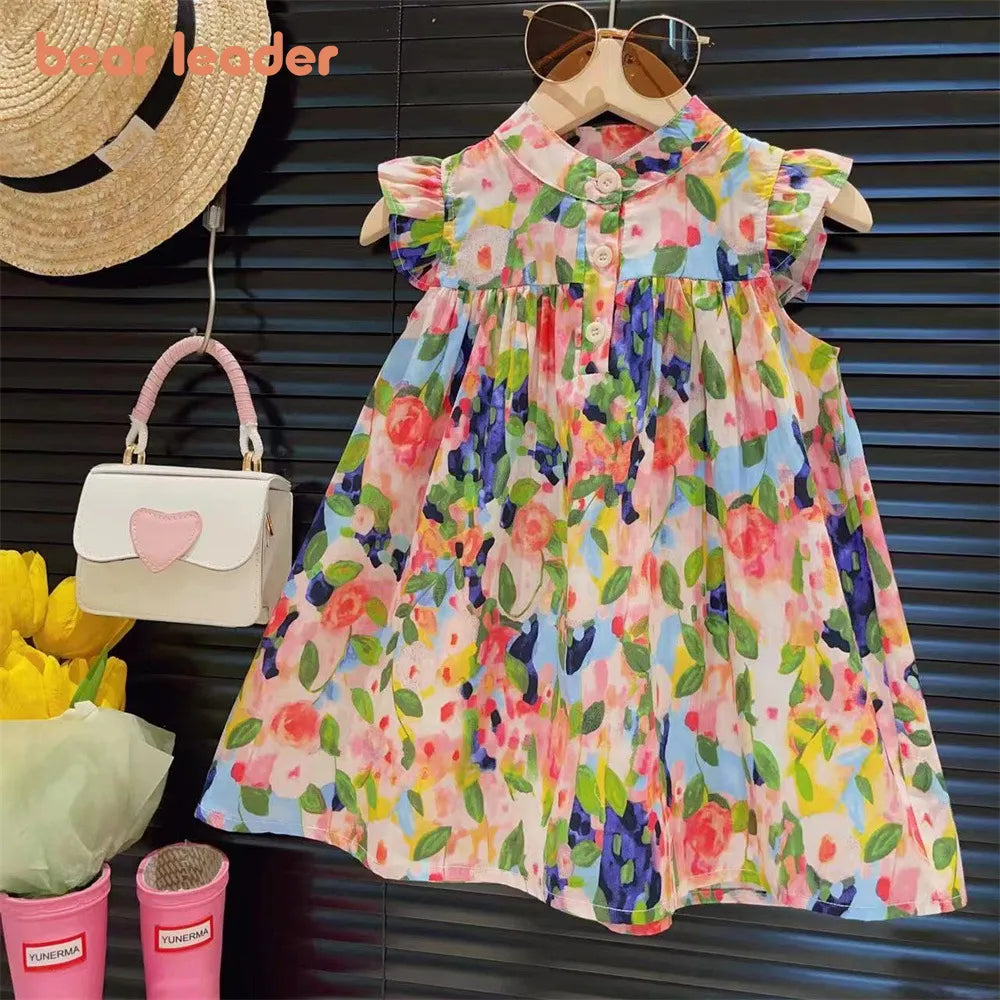 Close-up of floral print on a girl's flying sleeve summer dress, vibrant colors