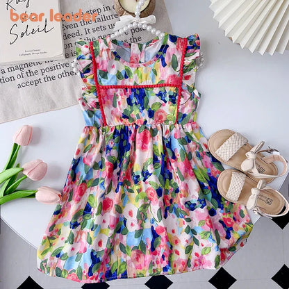 Toddler girl's floral ruffle dress, perfect for summer vacation or beach wear, sleeveless design.