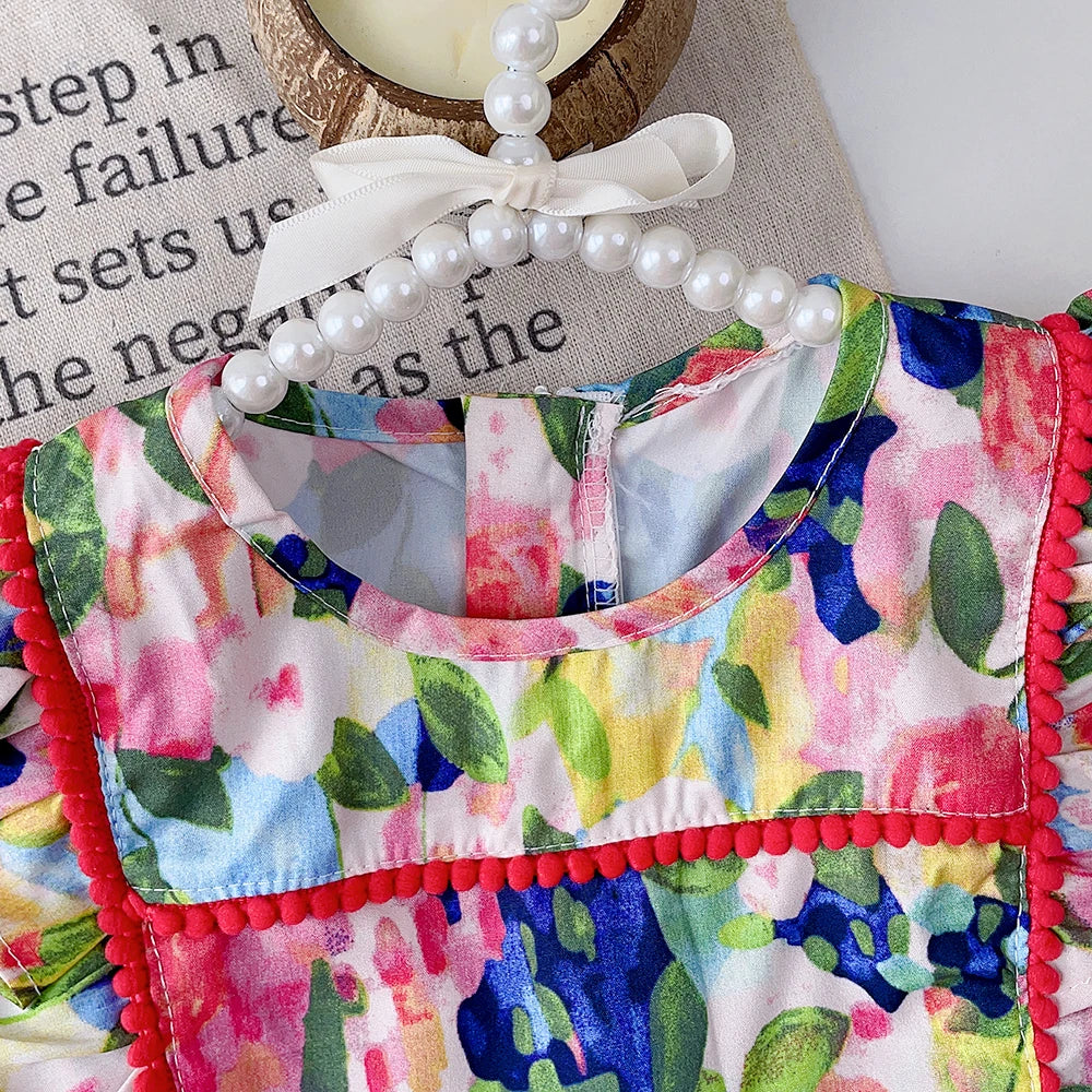 Girls' summer floral dress with ruffles, ideal for kids' fashion and play, a comfortable toddler outfit.