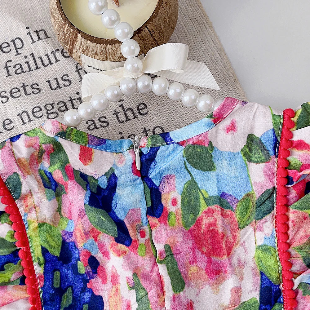 Cute girls' floral ruffle dress, sleeveless and airy, great for summer days, a stylish toddler outfit.