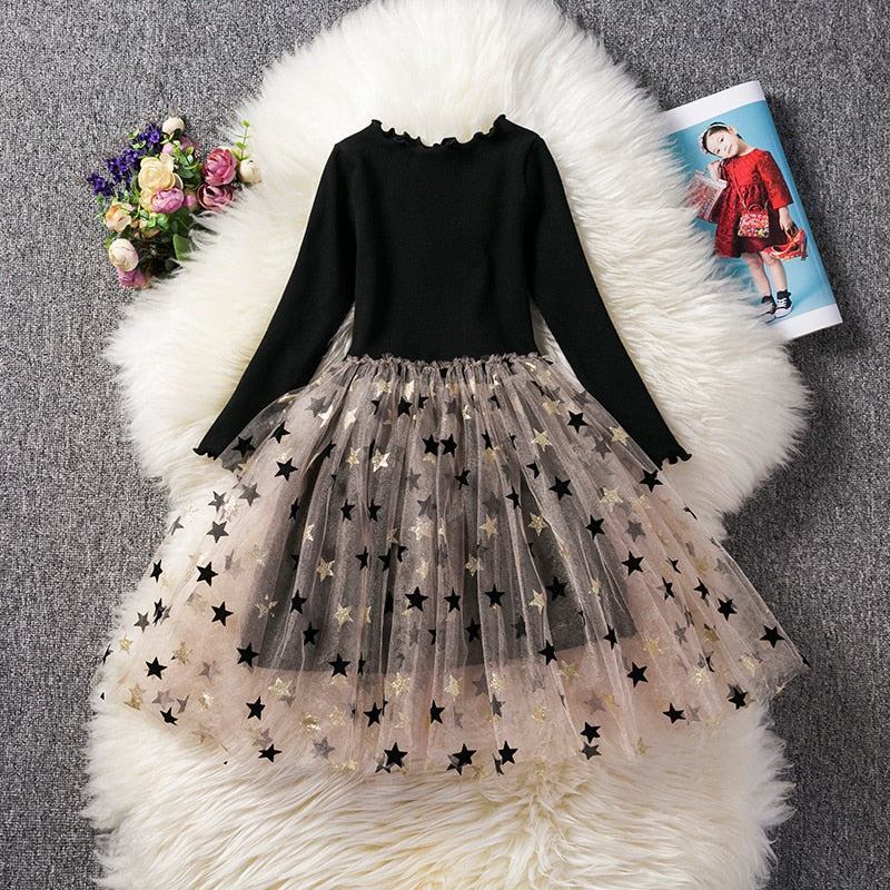 Elegant girls' party dress: white top with pink floral print and a pink ruffled tutu skirt