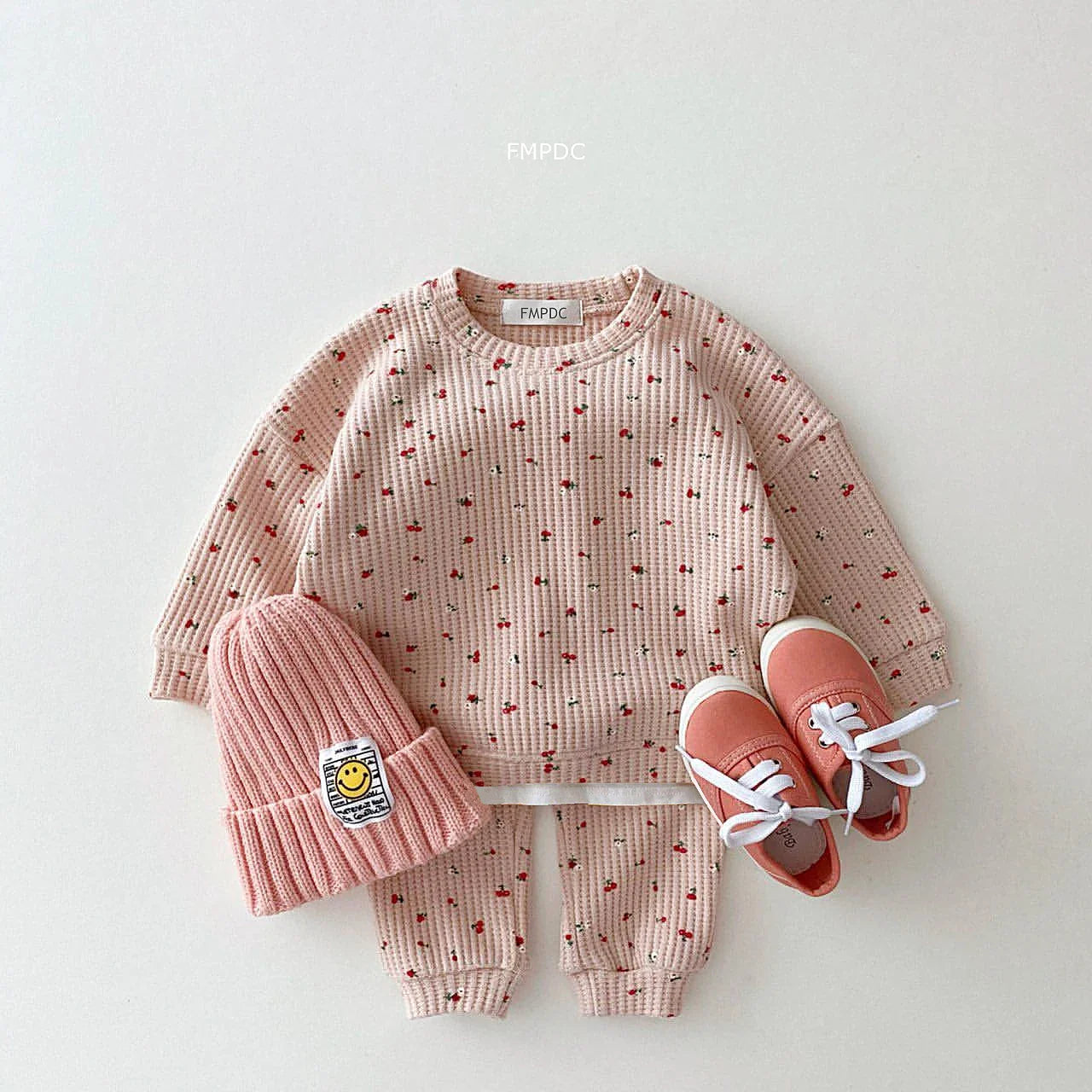 Toddler girl's multi-print top with cute ruffles, paired with matching cotton pants for spring/autumn.