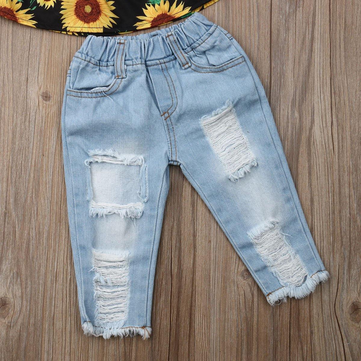 Fashionable girls' summer set: off-shoulder sunflower print blouse, ripped blue jeans, and a coordinating headband.