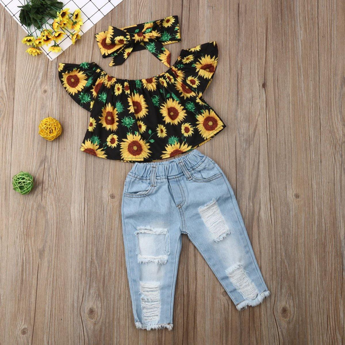 Complete toddler girl's playwear set including a vibrant sunflower off-shoulder top and trendy ripped jeans.