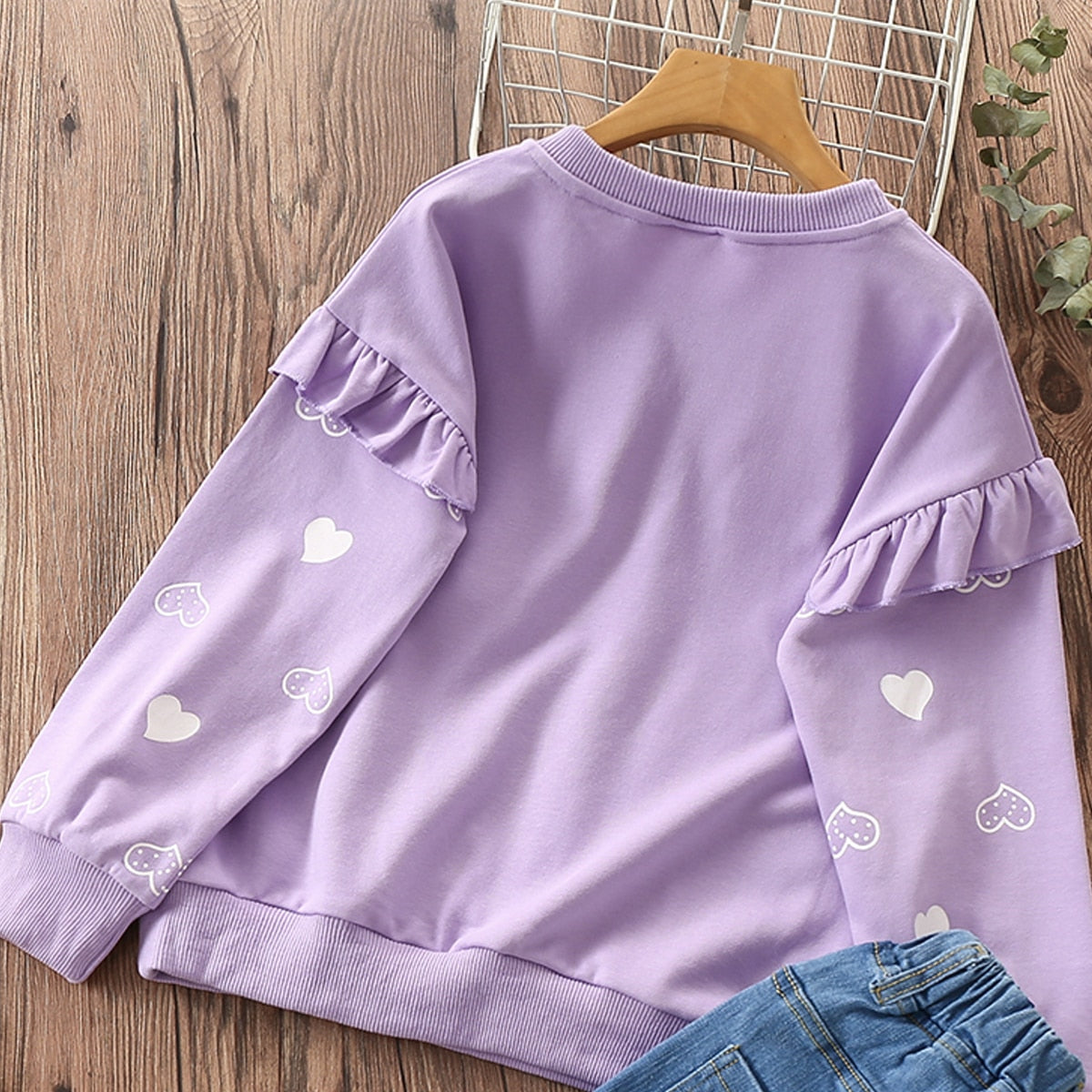 Cute cat and heart print girls' cotton sweater, a cozy and stylish choice for toddlers.