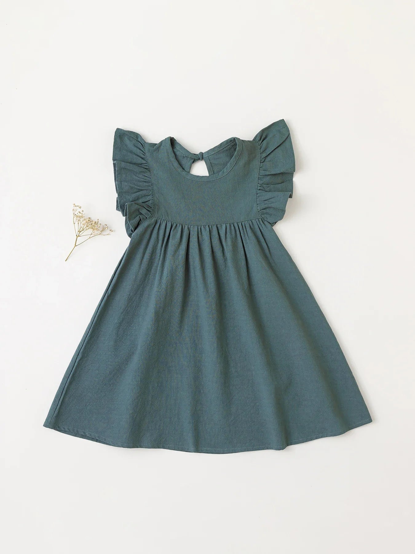 Elegant cream cotton overall dress with tie-back detail, toddler's summer choice