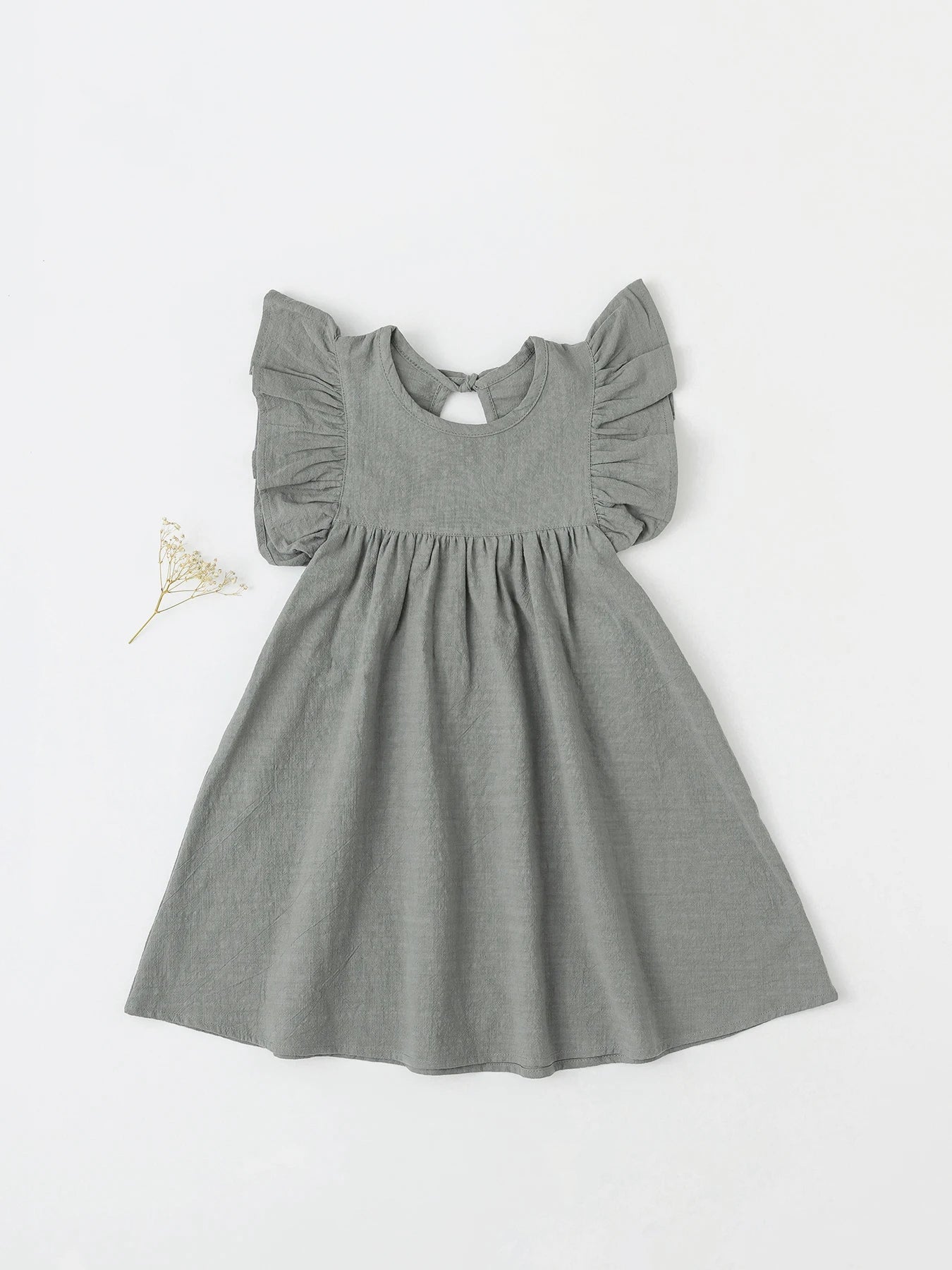 Bright orange girls' cotton tie-back overall dress, perfect for sunny summer outings