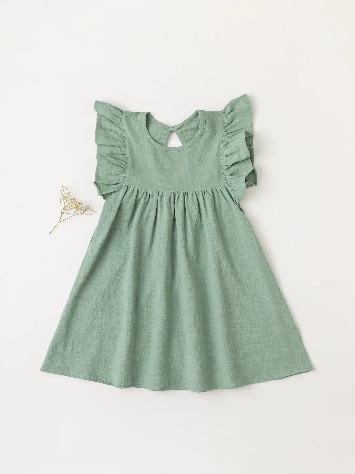 Light pink cotton overall dress with charming tie-back design, kids' summer fashion