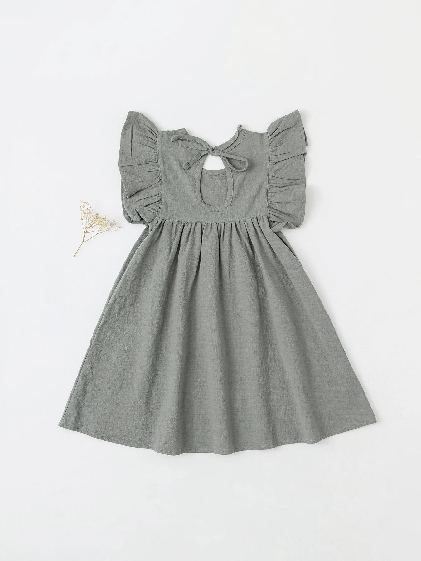 Simple beige cotton overall dress with tie-back, versatile for girls' summer casual