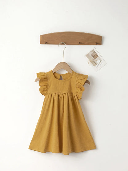 Girls' denim-look cotton overall dress with playful tie-back, knee-length summer style