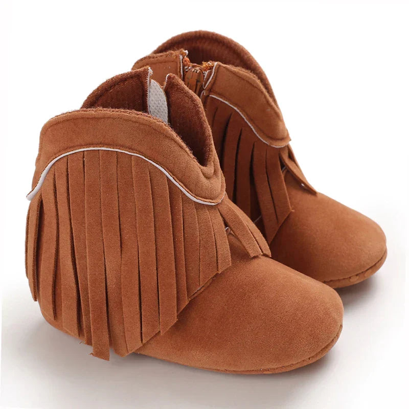 Brown toddler cowboy boots with fringe, comfortable western-inspired shoes for girls.