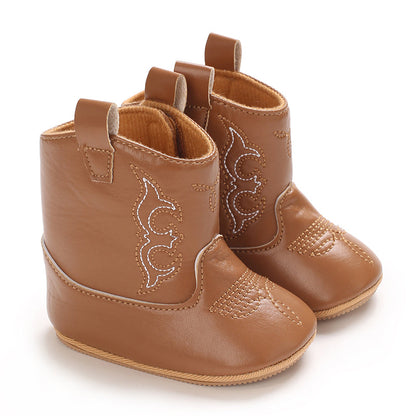 Toddler girl's purple fringe cowboy boots, comfortable and eye-catching western footwear.