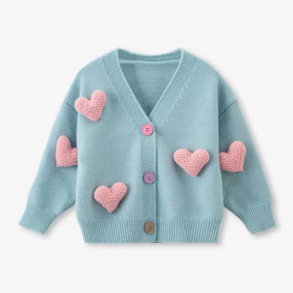 Infant girl's long sleeve knit sweater with a sweet heart motif, perfect for everyday kids fashion