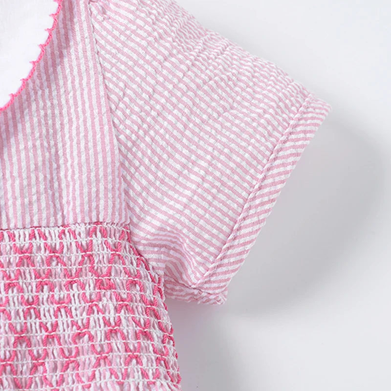 Girls' pink party dress featuring a charming rabbit print, ideal for summer and beach wear.