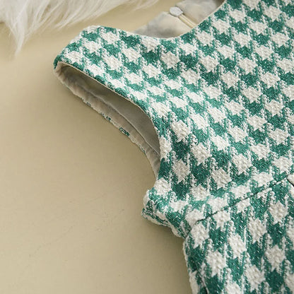 Girls' two-piece outfit set, checkered pattern, folded neatly to show cozy acrylic fabric