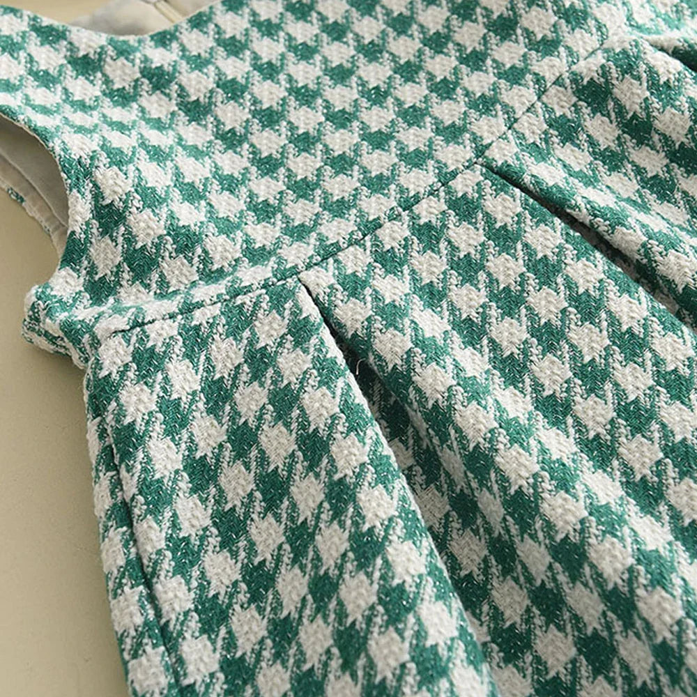 Girls' cozy checkered long-sleeve top with ribbed cuffs, part of a stylish toddler clothing set