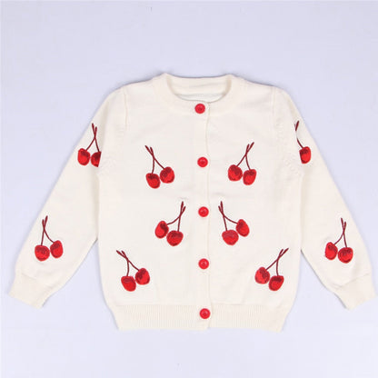 Side view of a toddler girl's plaid knitted cardigan, cozy outerwear design