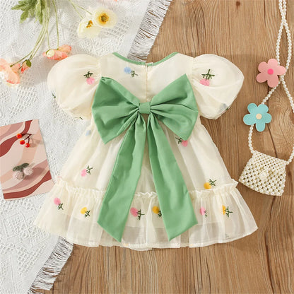Baby clothes: Adorable floral summer dress for girls with an elegant back bow.