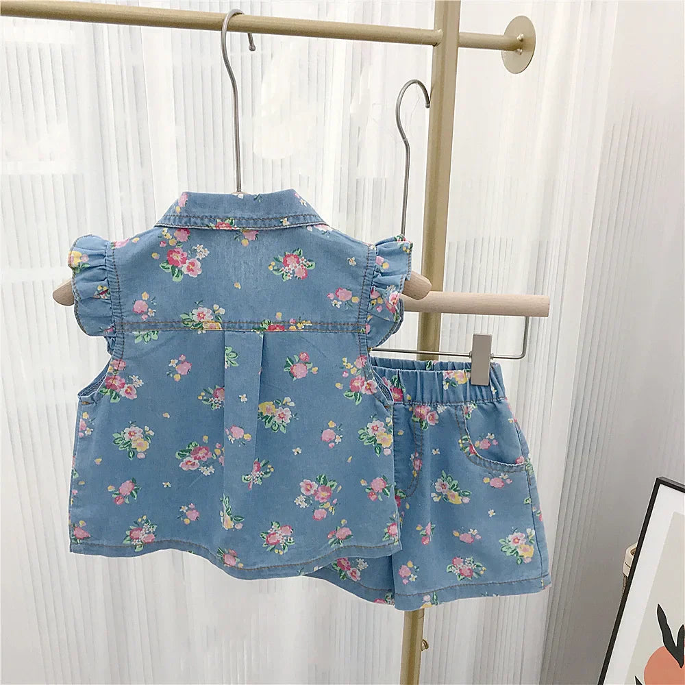 Comfortable toddler set with a sleeveless floral top and soft denim shorts, perfect for summer