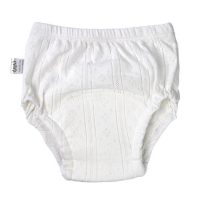 Close-up of blue reusable cotton potty training pants for boys, showing absorbent layers, baby clothing.