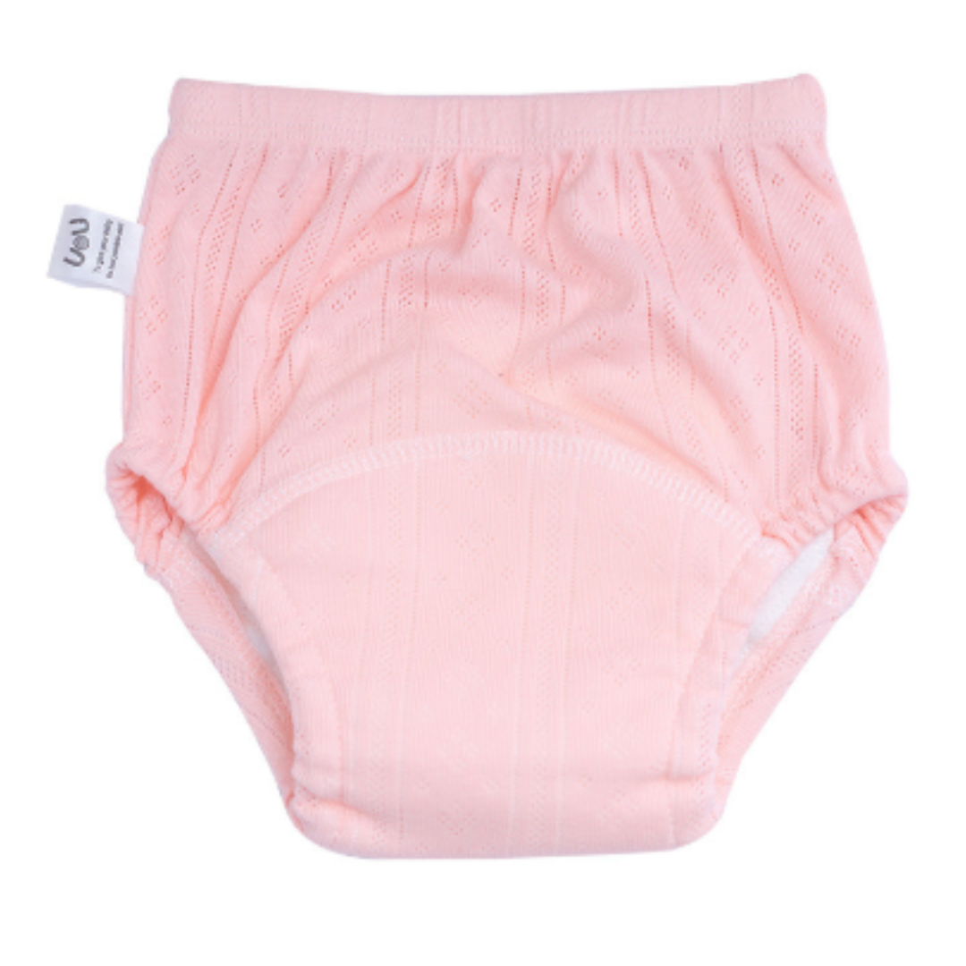Detail of elastic waistband on reusable cotton potty training pants, comfortable fit for active toddlers.