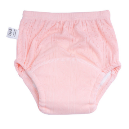 Detail of elastic waistband on reusable cotton potty training pants, comfortable fit for active toddlers.
