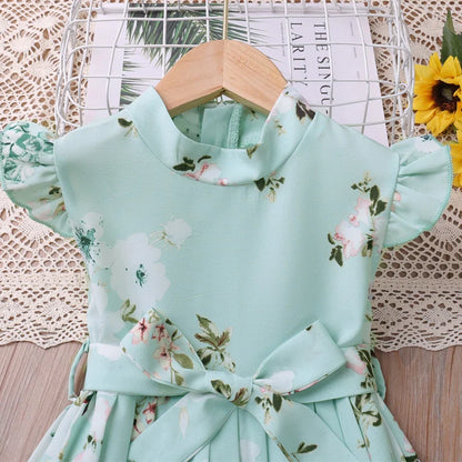 Toddler girl's summer outfit: blue and pink bow print tunic with solid leggings.