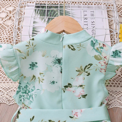 Girls' pink summer outfit featuring a bow-printed tunic and coordinating soft leggings.