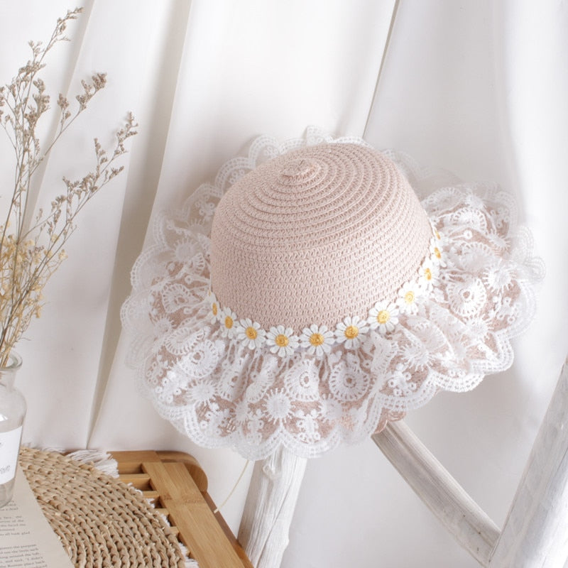 Breathable kids' sunflower straw hat, ideal for UV protection during summer activities