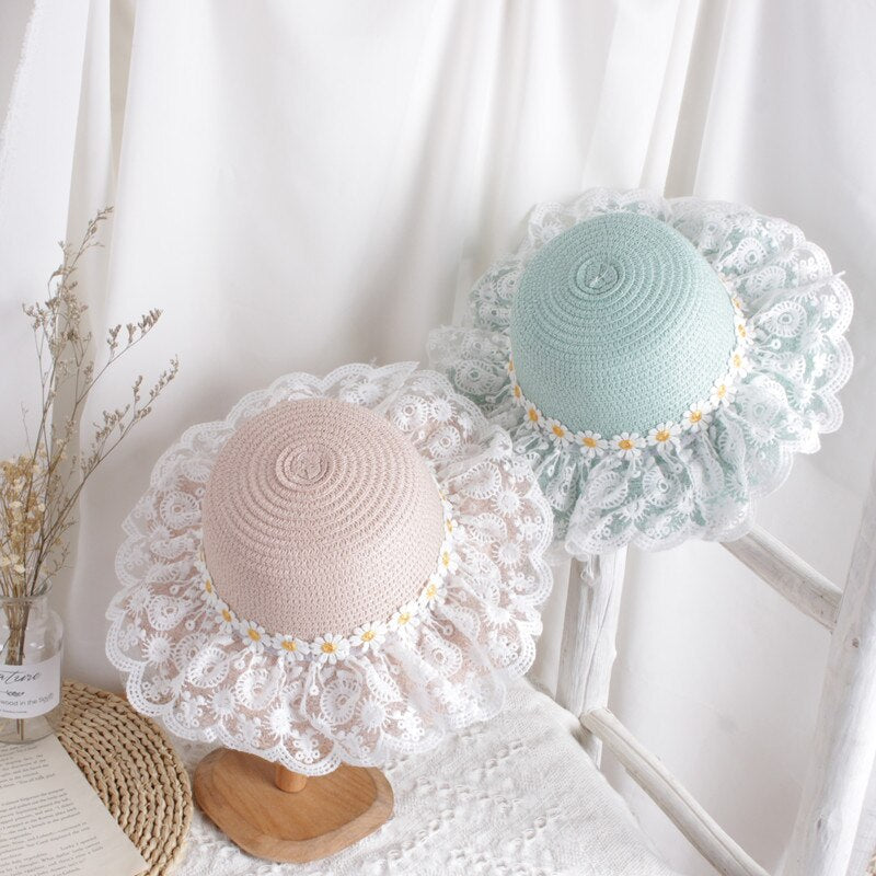 Kids' fashion sunflower straw hat with a chin strap for a secure fit on windy days