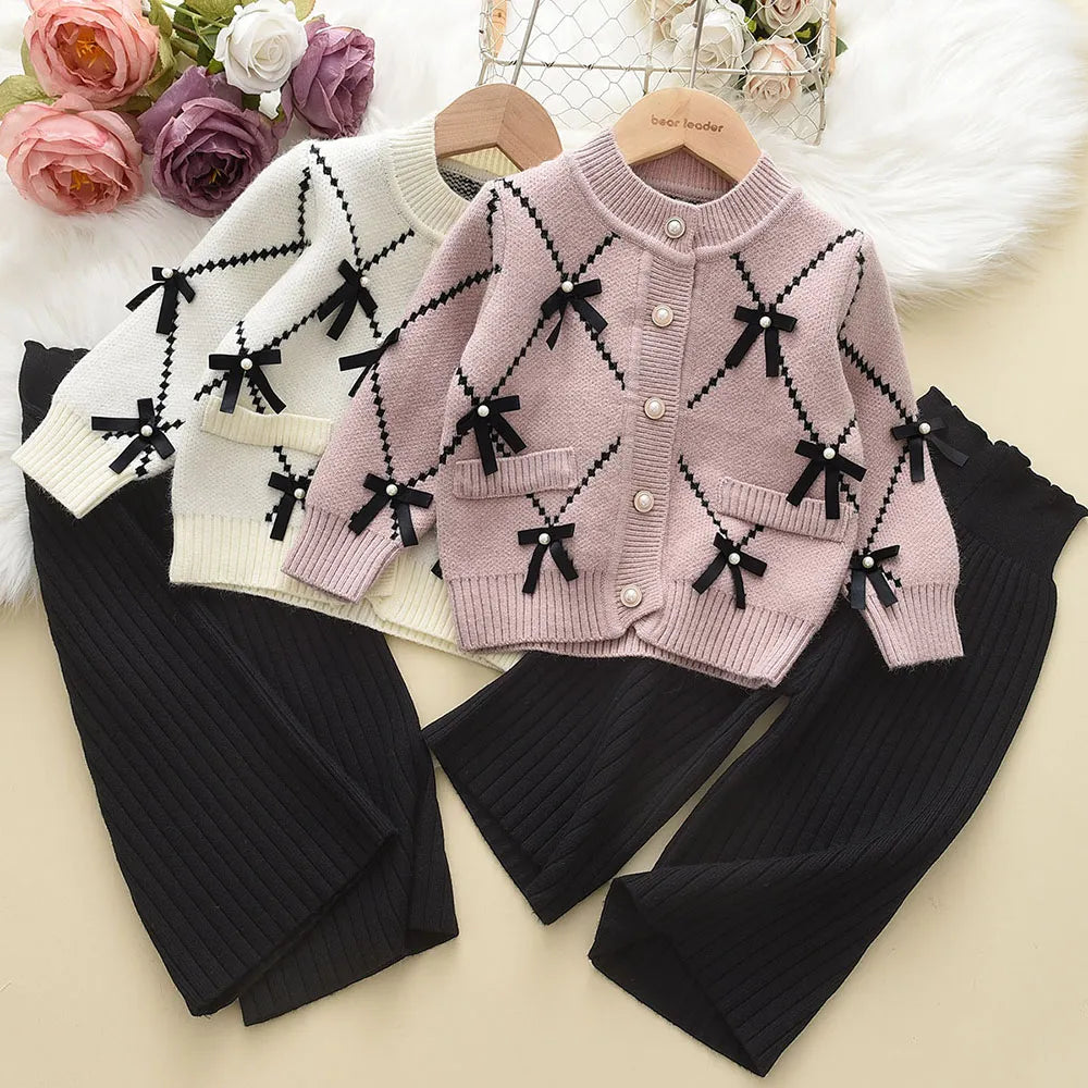 Girls' fashion: knitted pink winter sweatshirt and pants set for toddlers, comfortable and warm.