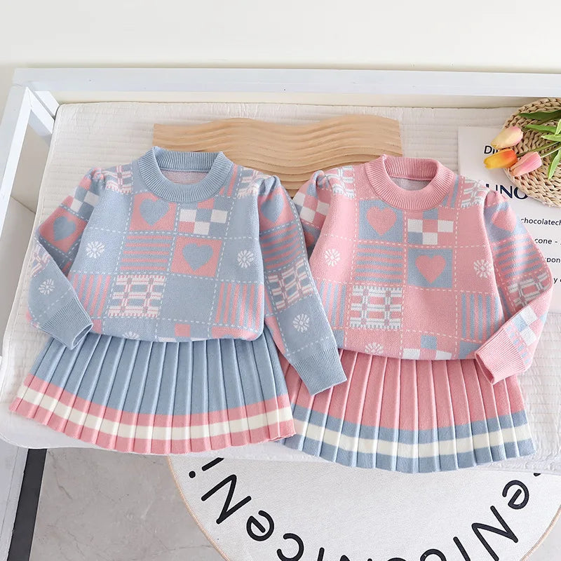 Pink knit sweater and matching pants for toddler girls, comfortable kids' style.