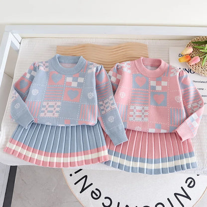 Pink knit sweater and matching pants for toddler girls, comfortable kids' style.