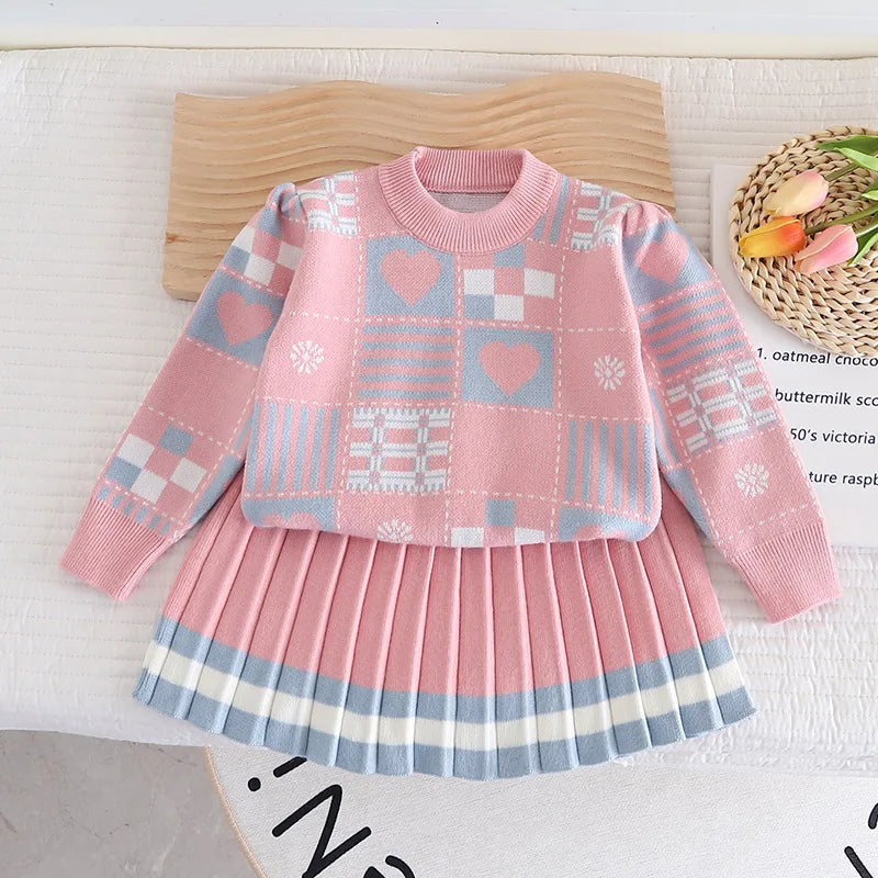 Two-piece knit set for toddler girls featuring a soft sweater and pants in blue.