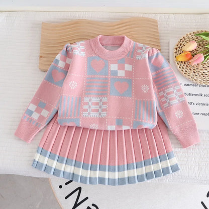 Two-piece knit set for toddler girls featuring a soft sweater and pants in blue.