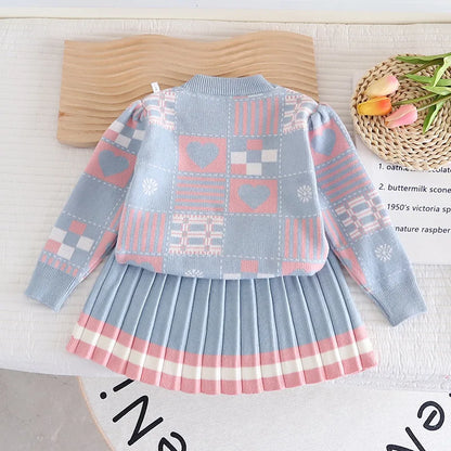Cozy pink knit sweater and pant set for toddlers, perfect for children's winter fashion.
