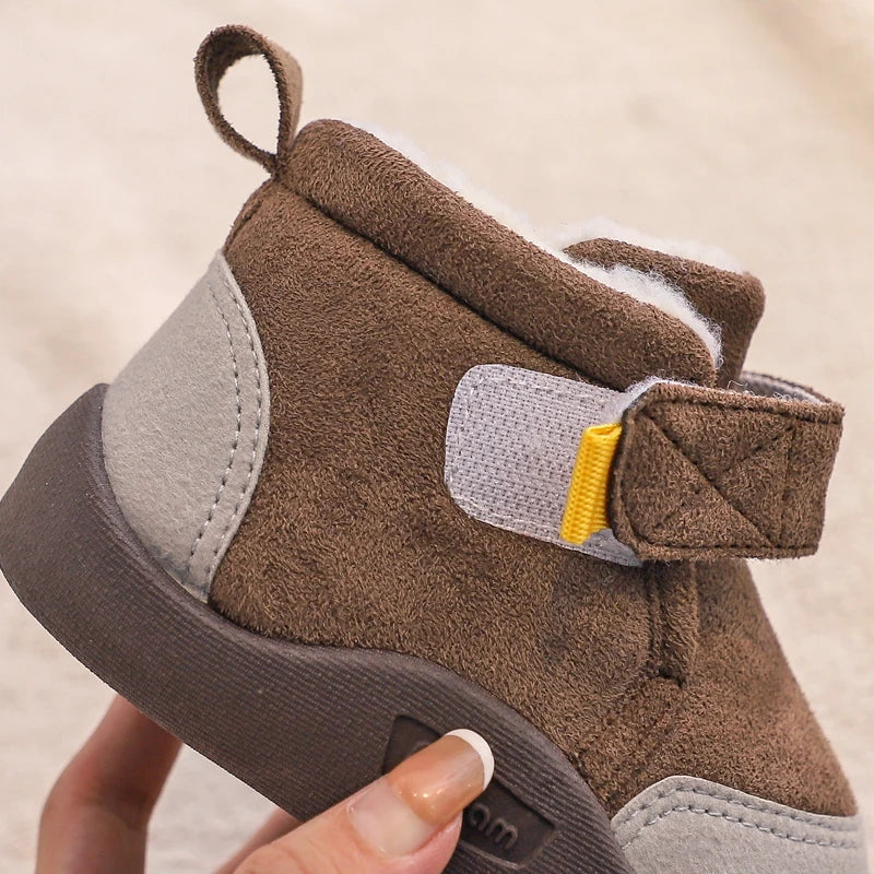 Winter footwear for baby girls, featuring a sturdy design and secure ankle support for toddlers