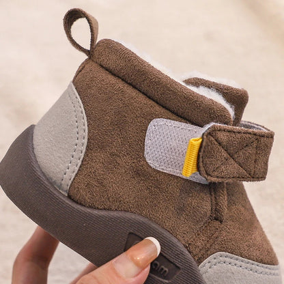 Winter footwear for baby girls, featuring a sturdy design and secure ankle support for toddlers