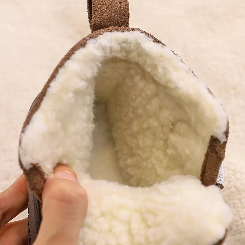 Top-down view of hook-and-loop toddler snow boots, easy for parents and children to put on