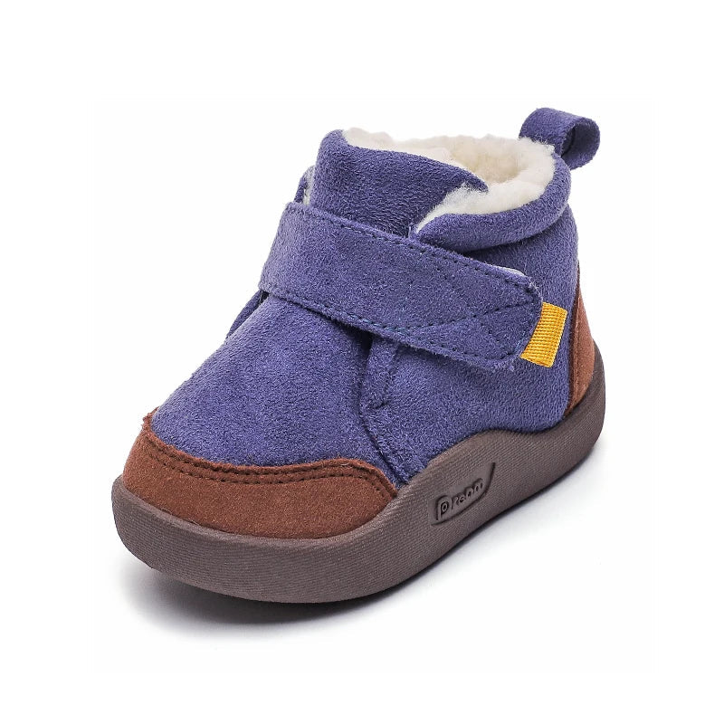 Assortment of toddler girls' warm winter boots, displaying various sizes for growing feet